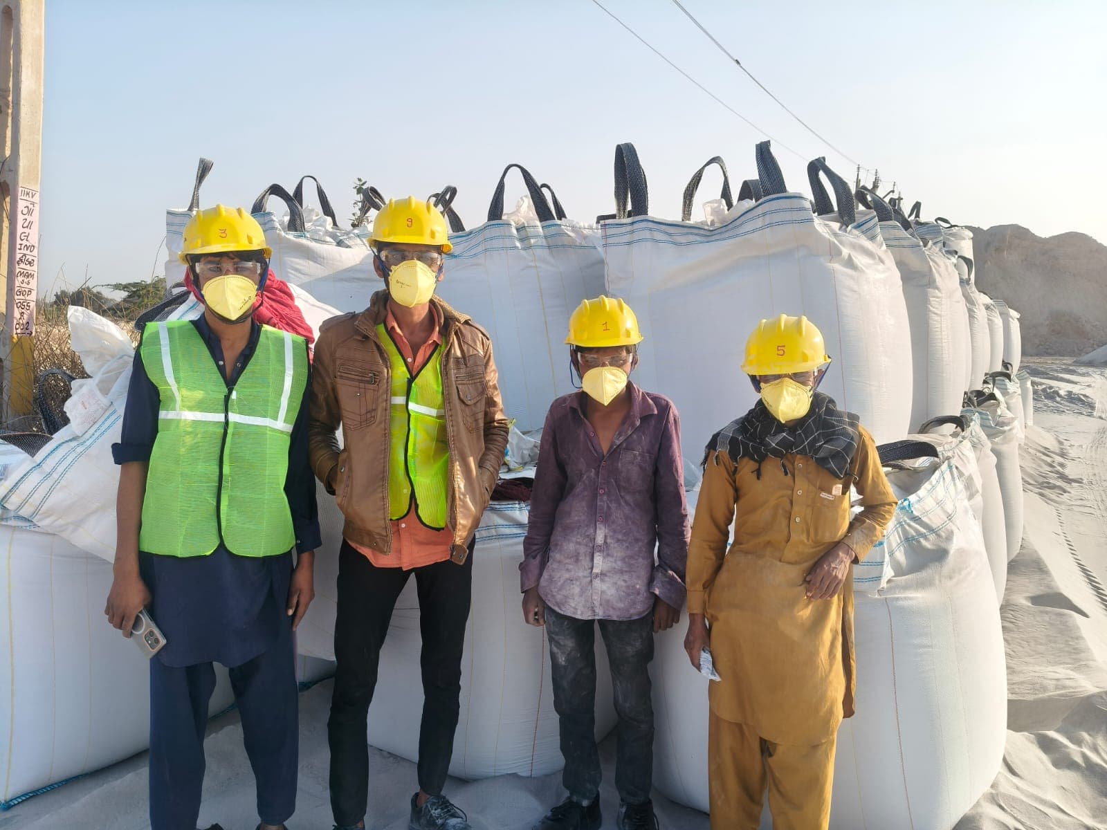 MLC team wearing helmets, masks, goggles and safety vests